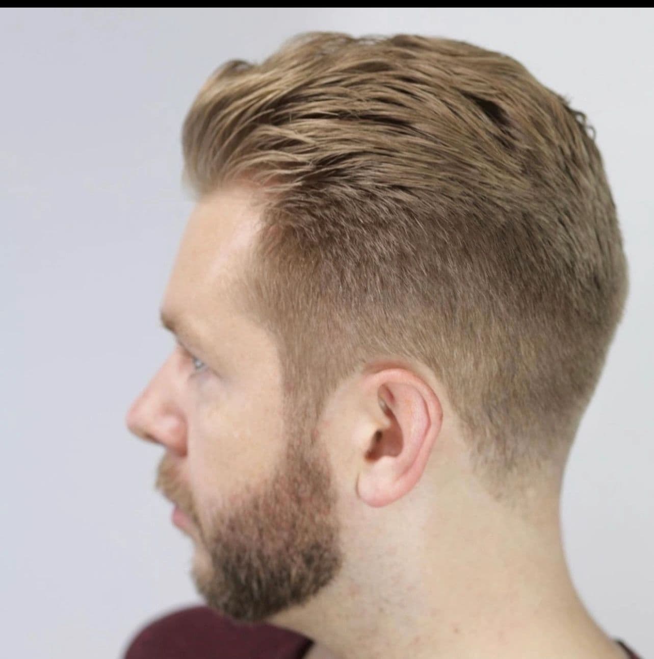 Classic side-part with a tapered finish