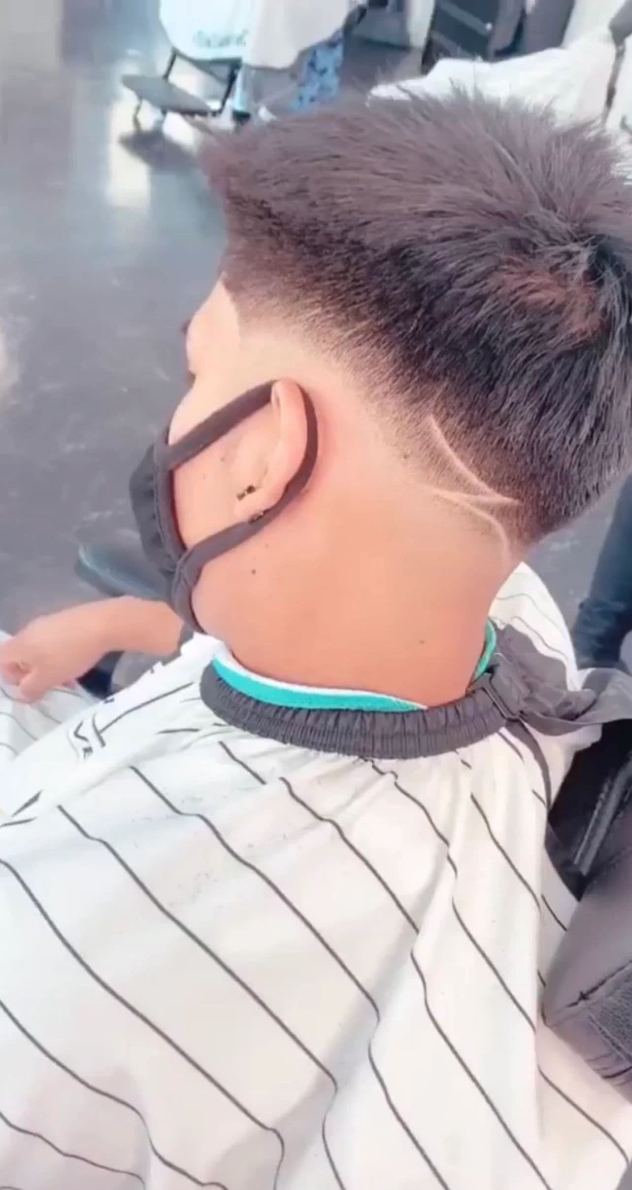 Skin fade with a hair design